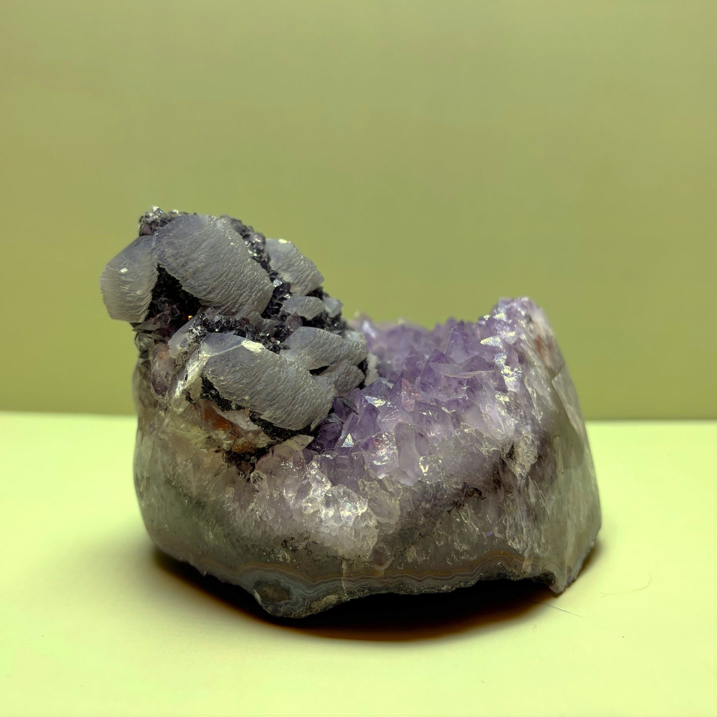 Light Purple Amethyst Geode (Agate Banded) with Layered Calcite on Hematite | Uruguay | 922 g | 95 x 100 x 65 mm.