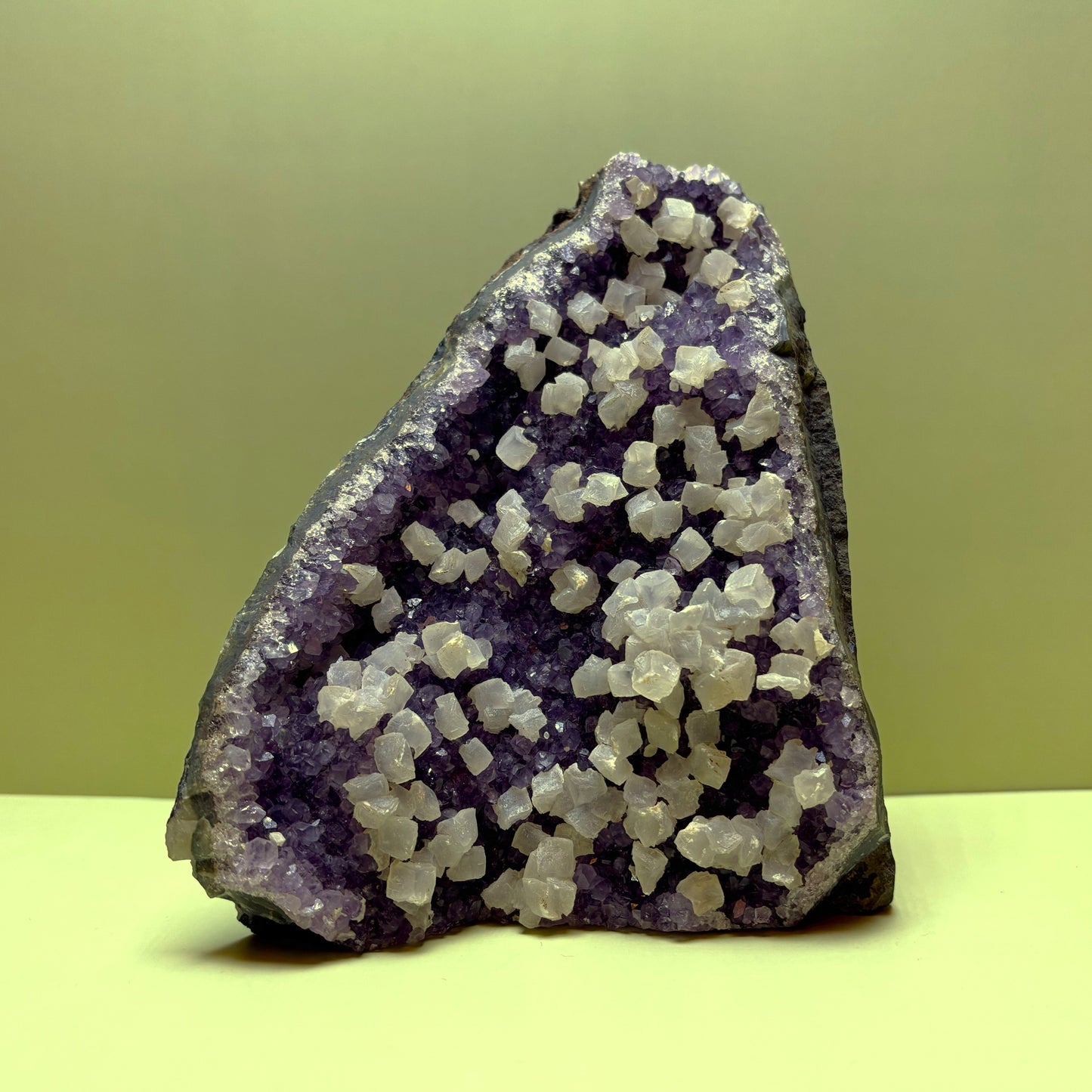 Deep Violet Amethyst Geode with White Calcite Blooms | Uruguay | 1,470 g | 130 x 105 x 90 mm.