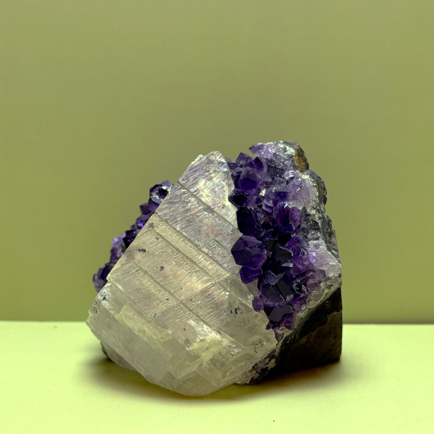 Rare Amethyst Cluster with Translucent Calcite Pyramid | Uruguay | 566 g | 75 x 105 x 110 mm.