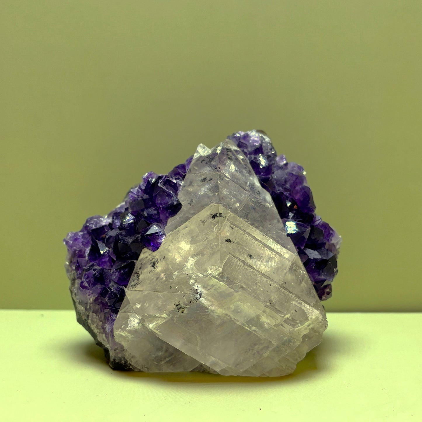 Rare Amethyst Cluster with Translucent Calcite Pyramid | Uruguay | 566 g | 75 x 105 x 110 mm.