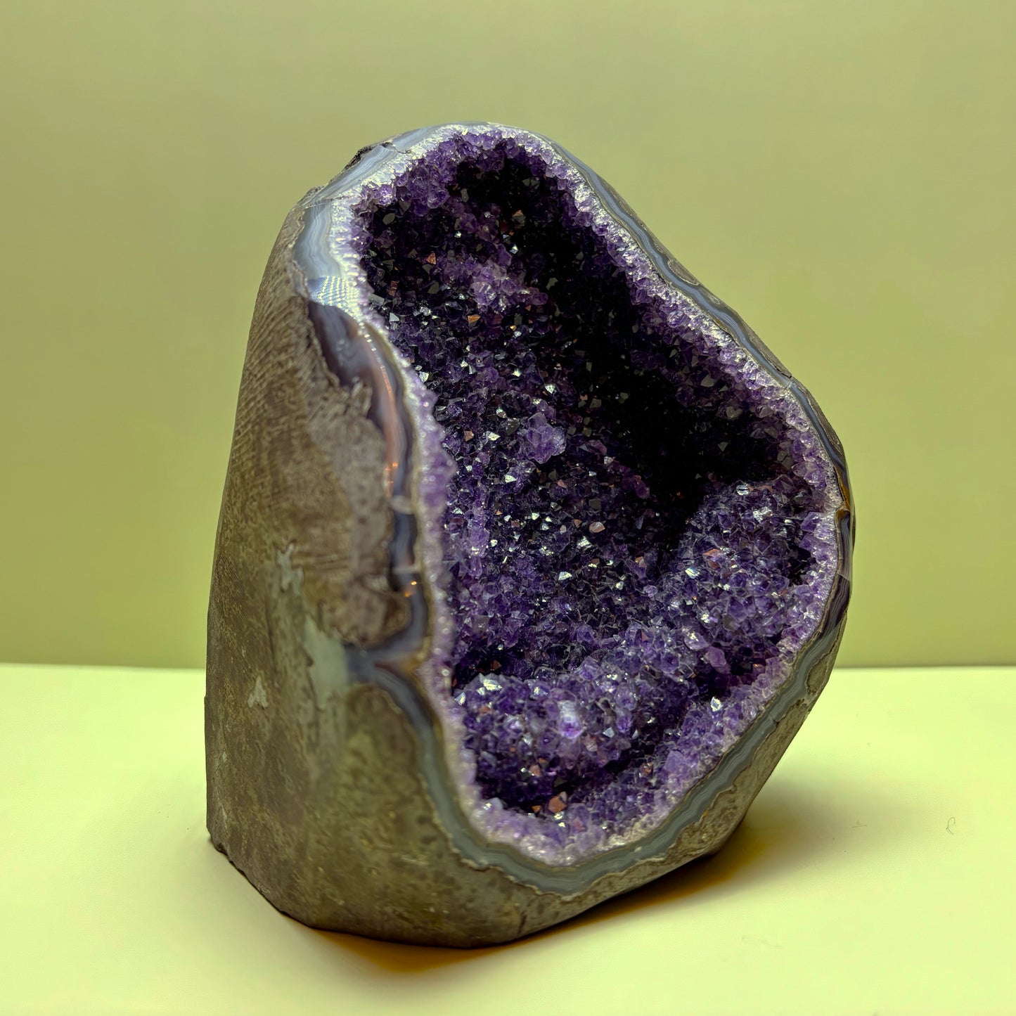 Rounded Deep Purple Amethyst Geode with Agate Bands | Uruguay | 1,468 g | 140 x 115 x 95 mm.