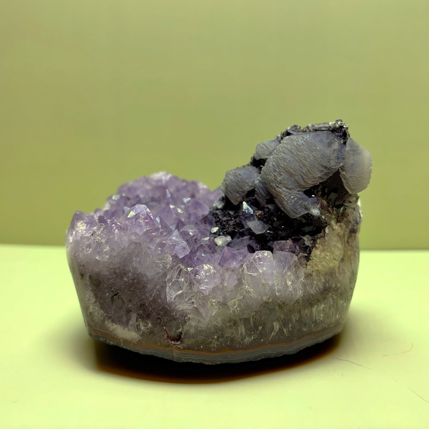 Light Purple Amethyst Geode (Agate Banded) with Layered Calcite on Hematite | Uruguay  | 922 g | 95 x 100 x 65 mm.